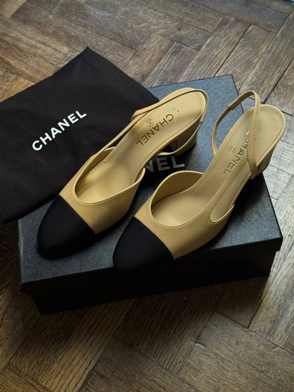 CHANEL Beige Slingback Pumps with Black Cap Toe